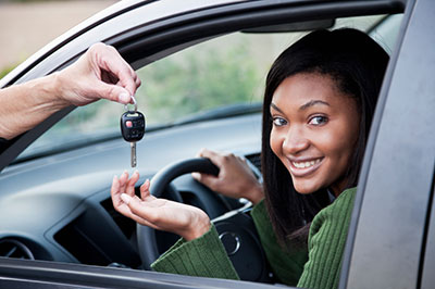 a person sitting in a car